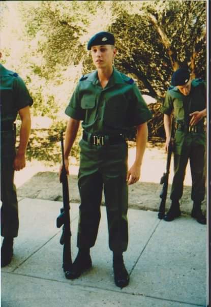 Gordon Webb standing to attention, dressed in an ADF uniform.