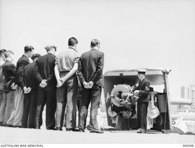 Naval reserve depot, Sydney - merchant servicemen receive instructions. (October 1939)