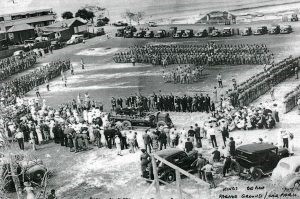Black and white photo of soldiers parading