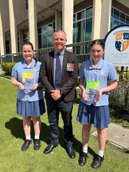 St Joseph's College teacher and students