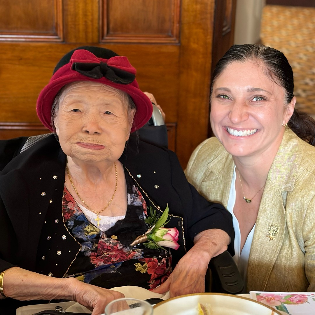 Gwen Cherne with war widow Maria on War Widows Day in Sydney