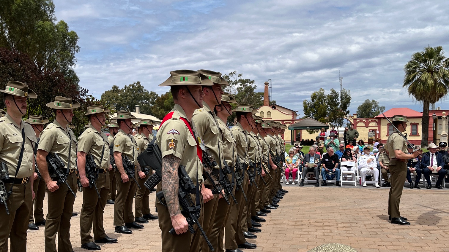Members of 7th Battalion Royal Australian Regiment form the Guard of Honour at the Port Augusta War Memorial