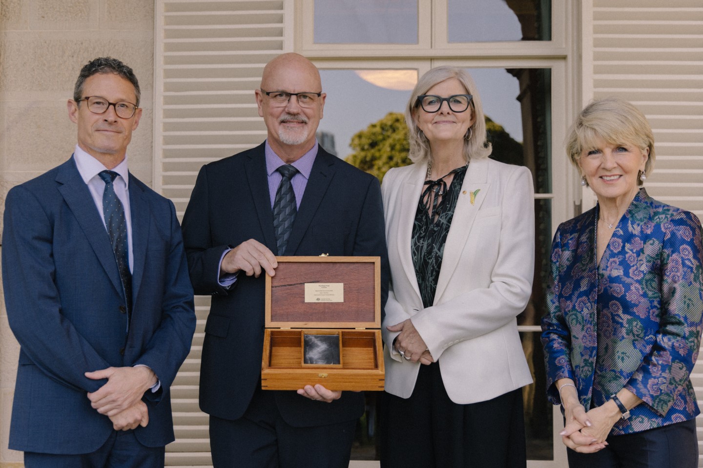 Image: (L to R) DVA First Assistant Secretary Mark Brewer AM CSC Bar, Garry Harding, Governor-General Sam Mostyn AC and ANU Chancellor Julie Bishop.