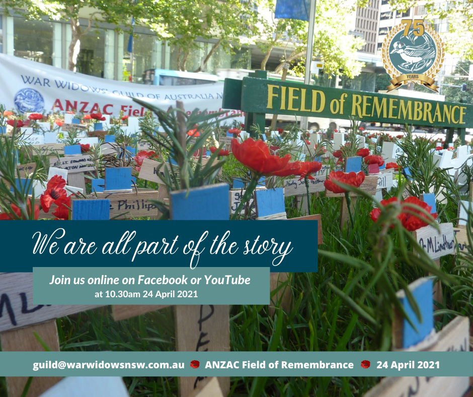 Row of poppies with timber crosses with people's names on them. A large sign reads Field of Remembrance.