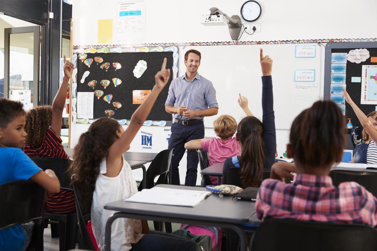Teacher in front of classroom