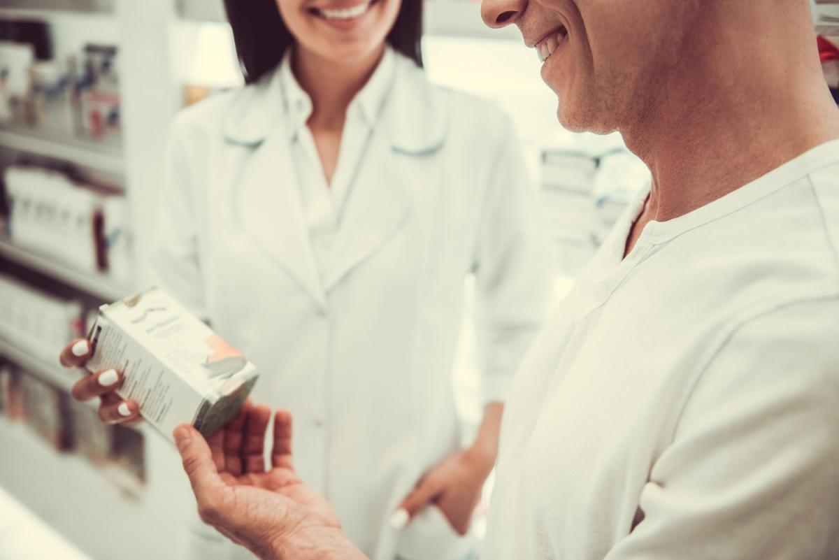 Pharmacist with customer