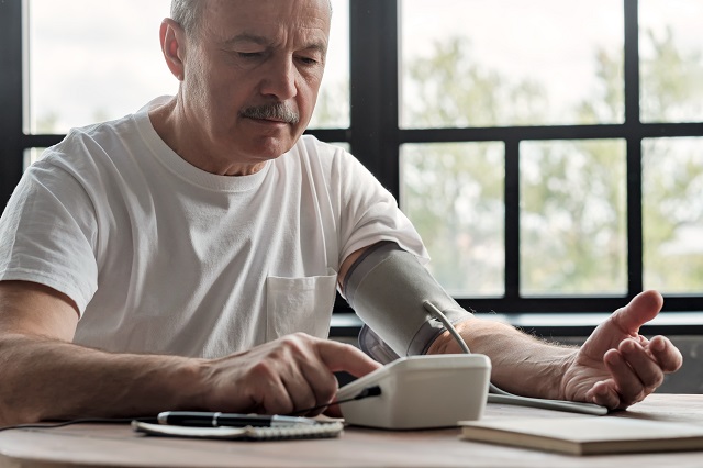 Man checking his blood pressure