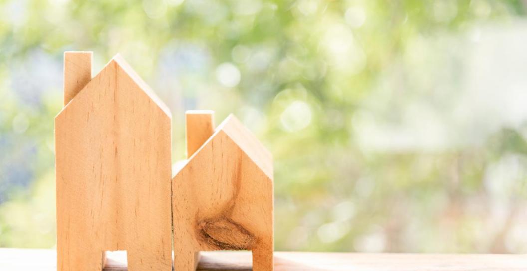 Timber model of two houses