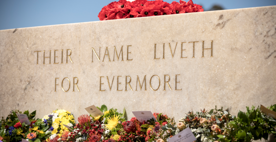 Stone wall inscribe with 'Their name liveth for evermore', with wreaths