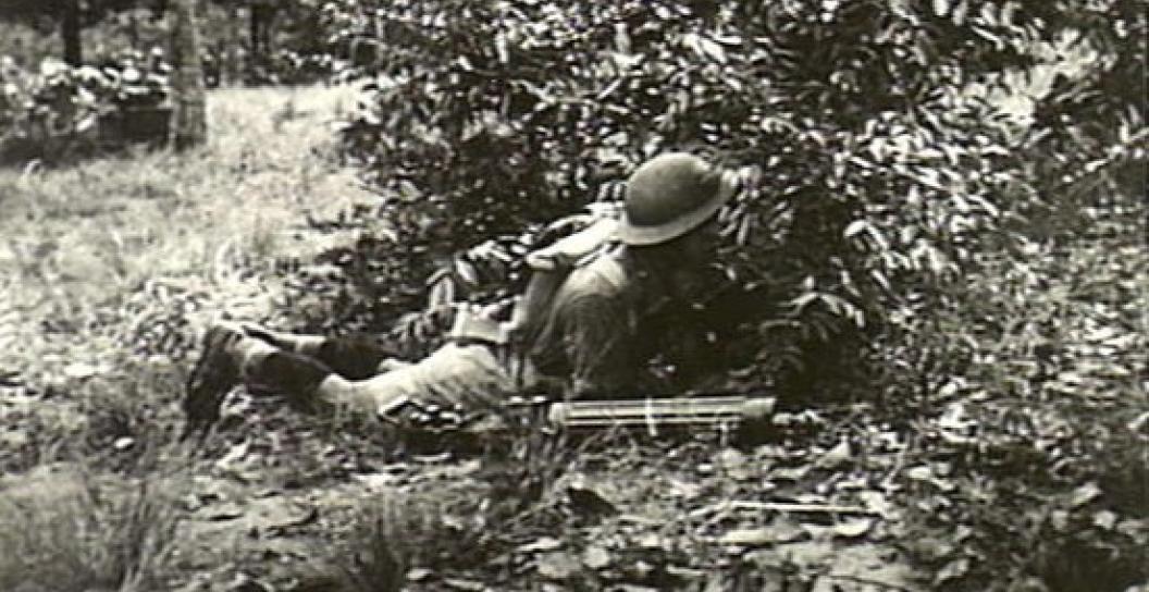 Malaya 1941. Waiting for the signal to bring machine gun into action.
