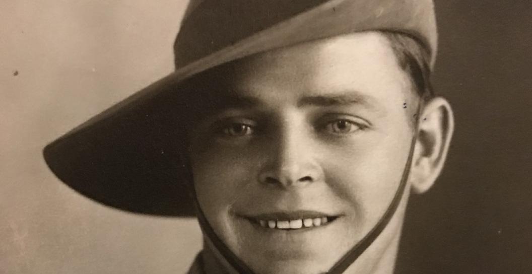 Black and white photo from 1940s of young man in Army uniform