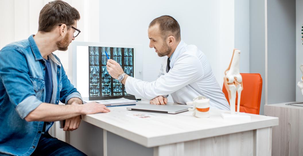 Man with consultation with therapist
