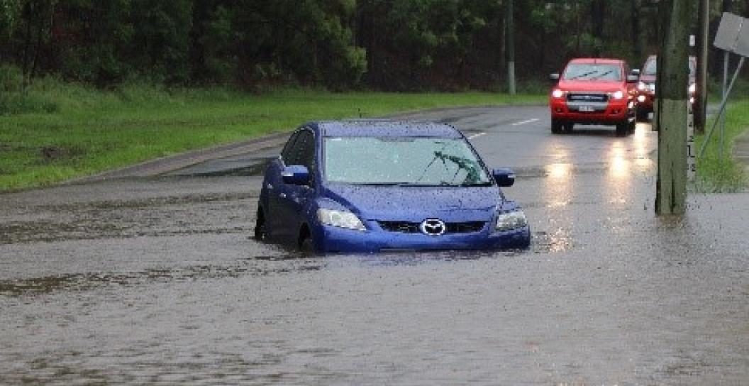 Car trapped in flood waters