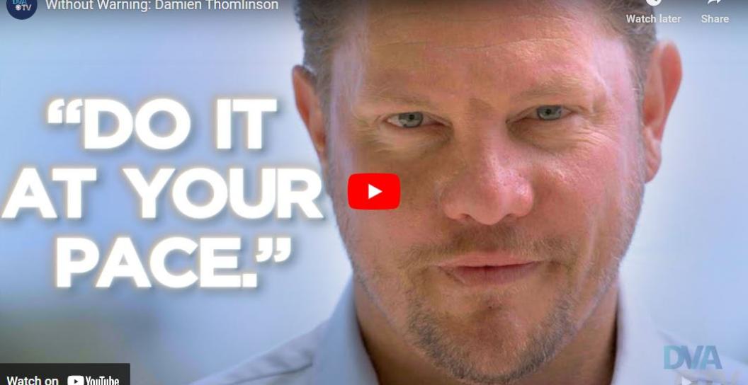 Video still of man being interviewed with words on screen saying 'Do it at your pace'.