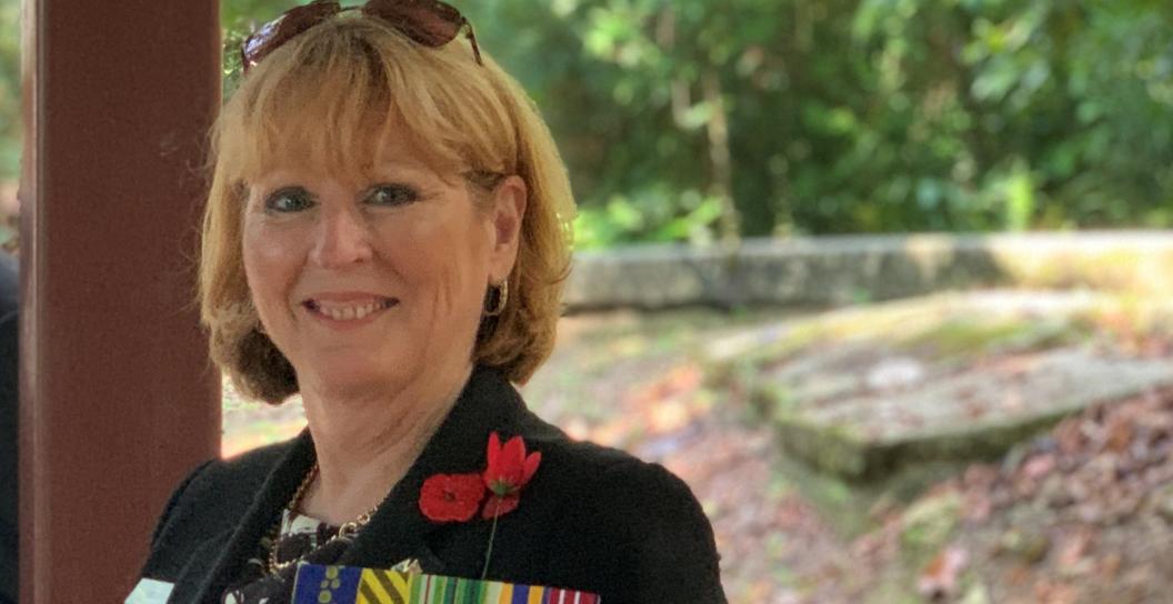 Smiling woman wearing medals