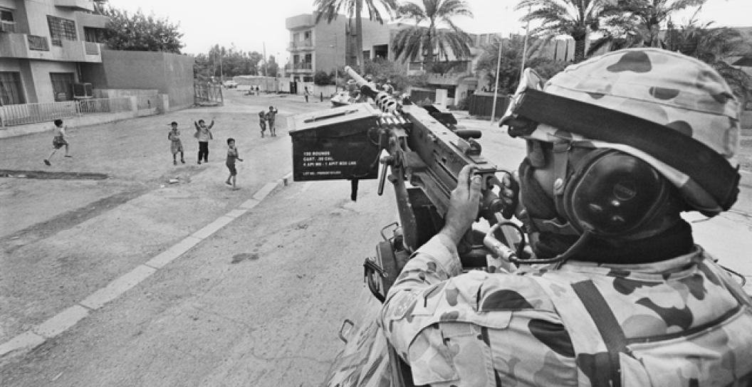 A soldier of the 2nd Cavalry Regiment, in the turret of an Australian Light Armoured Vehicle in Baghdad