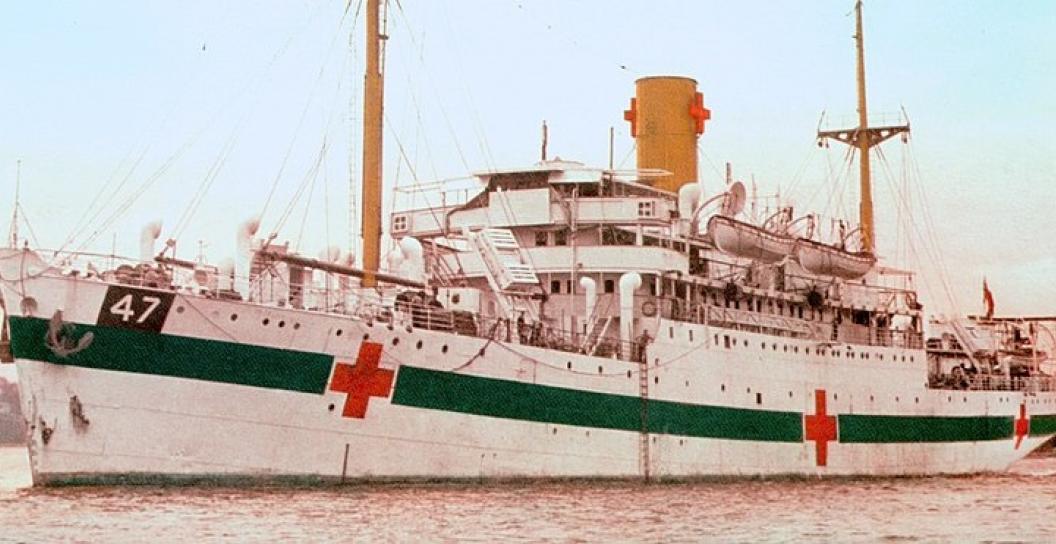 Colour photo of hospital ship at anchor