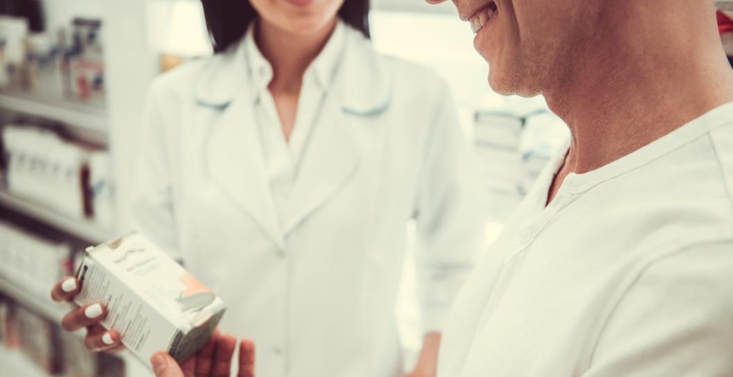 Pharmacist with customer
