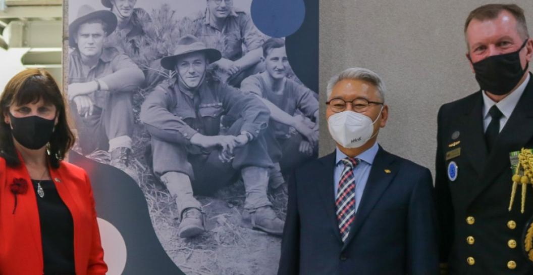 Ambassador to the Republic of Korea, Ms Catherine Raper, at the photo exhibition with two others