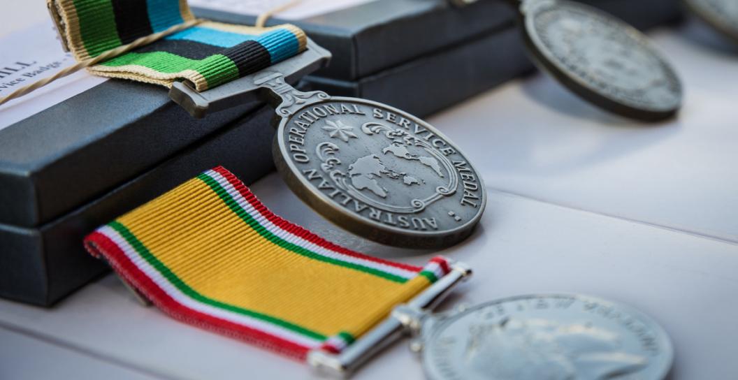 A row of medals on a table