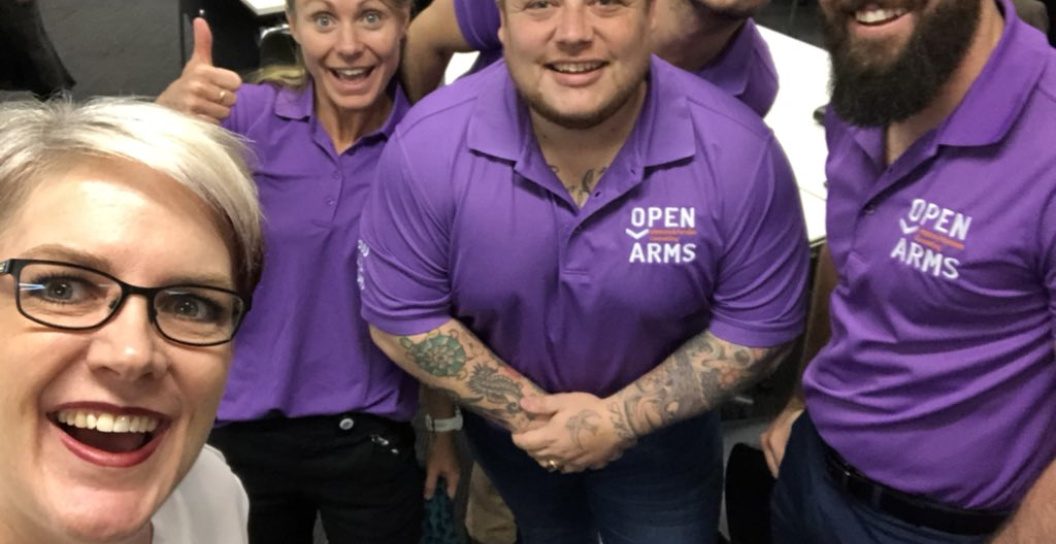 Friendly people smiling at camera