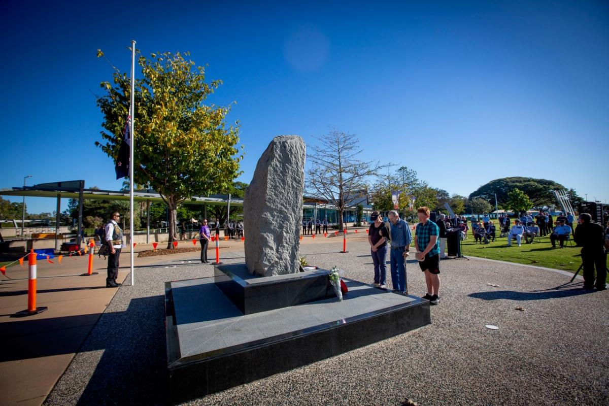 People gathered round cenotaph